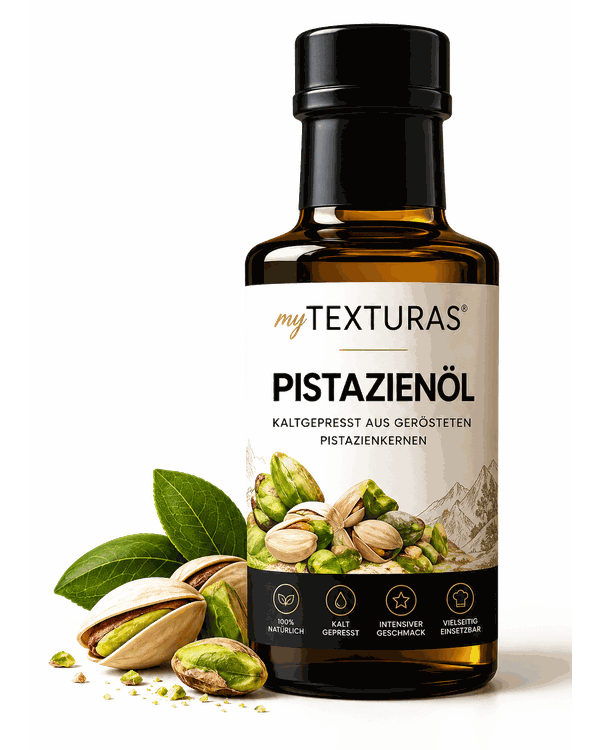 Flasche myTEXTURAS Pistazienöl neben Pistazienkernen